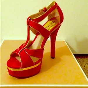 Like new MK gold and red heels.